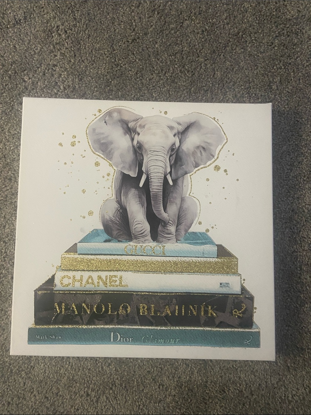 Elephant on Fashion Books Canvas Art - Blue, Gold, White